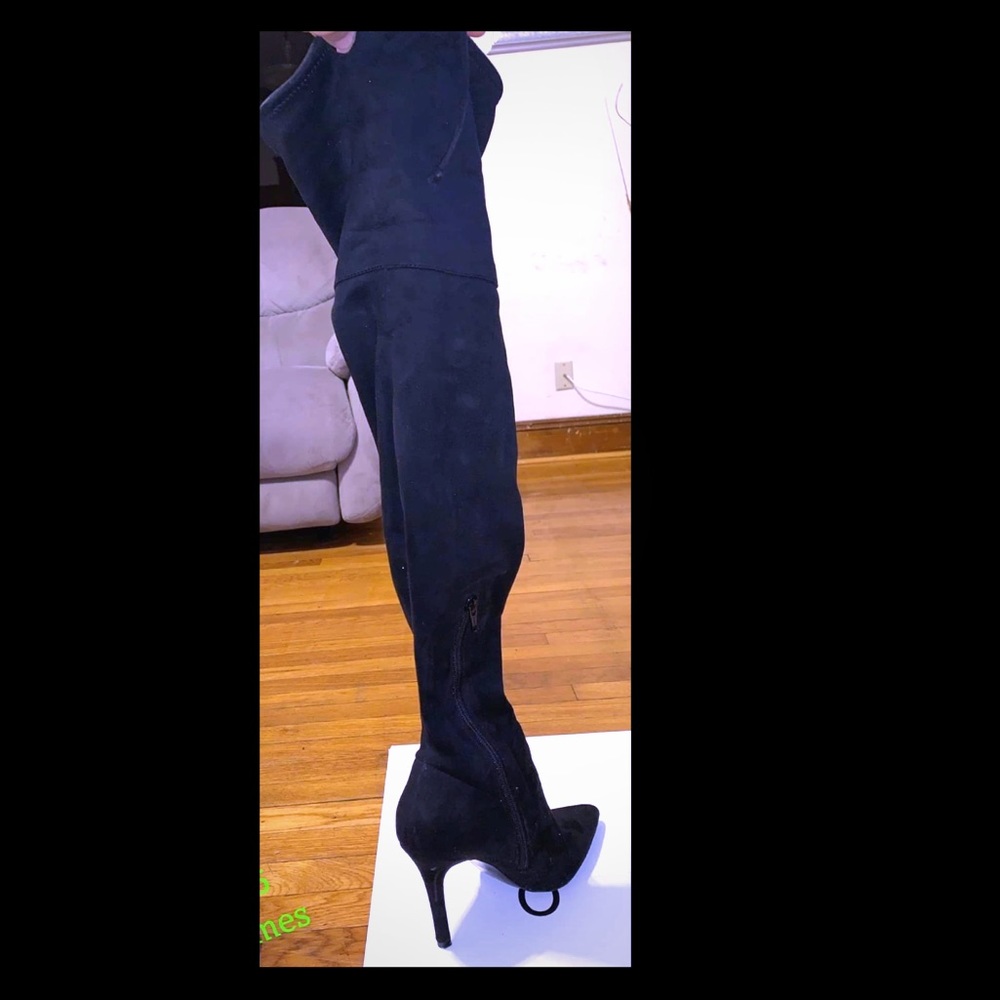 Thigh high heeled boots